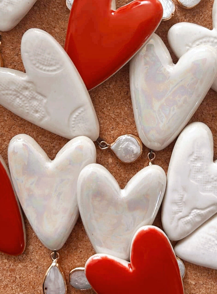 Heart with dangling Pearl - White glazed